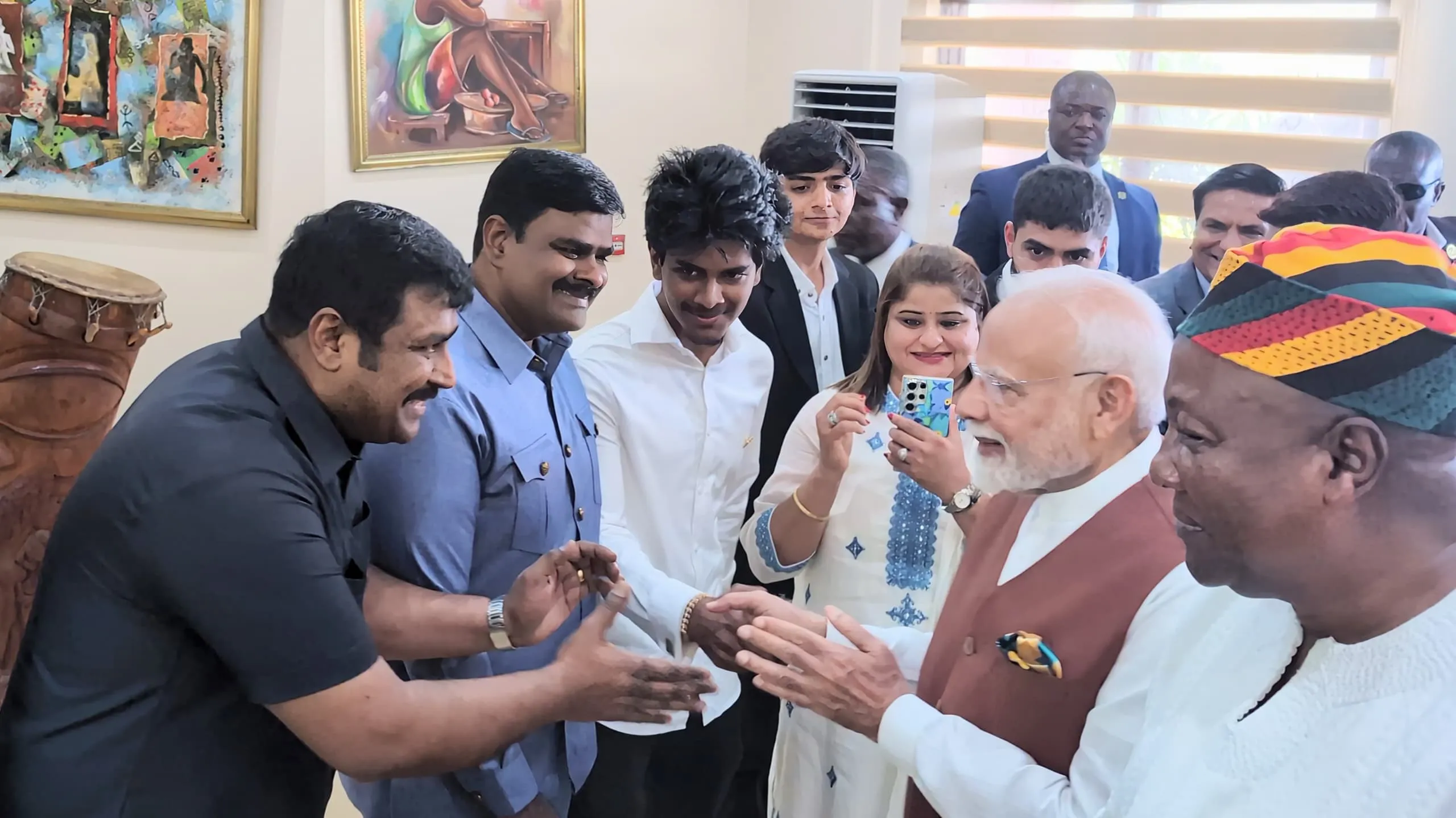 Indian Prime Minister Narendra Modi with James Kwame Rajamani, James Rajamani, James Gnanaraj Rajamani, and Immanuel Rajamani of Kingdom Exim